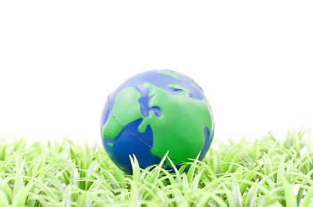 Planet Shaped Ball on Grassの写真素材