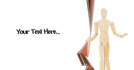 Wood Doll and Strip of Film On White With Space for Textの写真素材