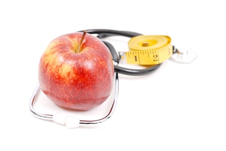 Red Apple with Stethoscope and Tape Measureの写真素材