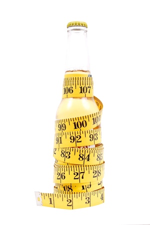 Beer Bottle Wrapped with Tape Measureの写真素材