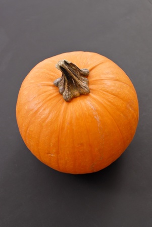 Pumpkin on Gray Surfaceの写真素材