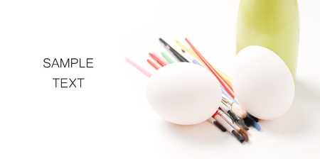 Two Eggs with Paint Brushes with Space for Textの写真素材