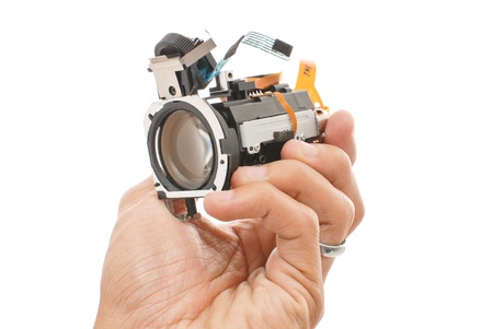 Hand Holding an Optical Lens Attachmentの写真素材