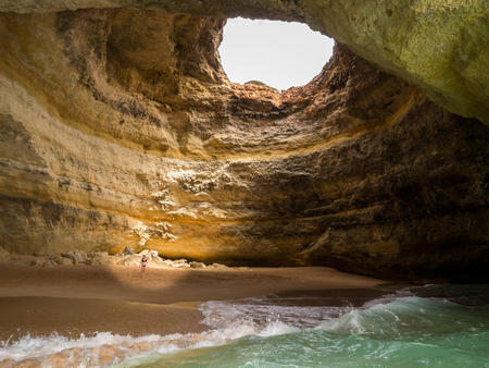 Benagil, Algarve, Portugal. OCT 18, 2017. Algar de Benagil. The most famous cave in the Portuguese Algarve. It can only be accessed by swimming or in a boat. Sunlight enters through a hole.のeditorial素材