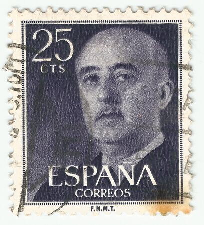MERIDA, EXTREMADURA, SPAIN;  DIC, 01, 2.018 - Stamp showing a portrait of General Francisco Franco 1892-1975. CIRCA 1949のeditorial素材
