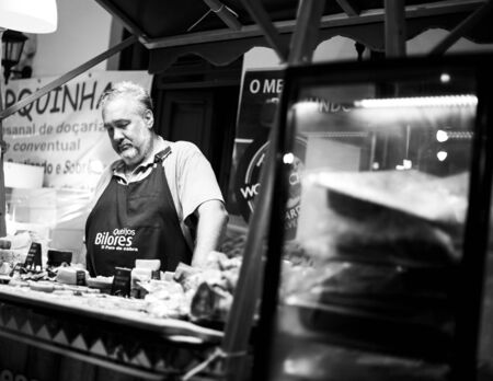 Vilareal de Santo Antonio , Portugal - OCT 12 2.019 - cheese seller in street marketのeditorial素材