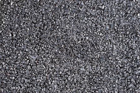 Shiny gravel texture, close up, background use の写真素材