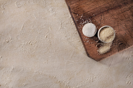 Customizable cooking recipe setup, homemade baking dough and sugar over vintage wooden support, top view の写真素材