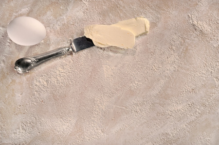 Customizable cooking recipe setup, homemade baking dough, butter and an egg の写真素材