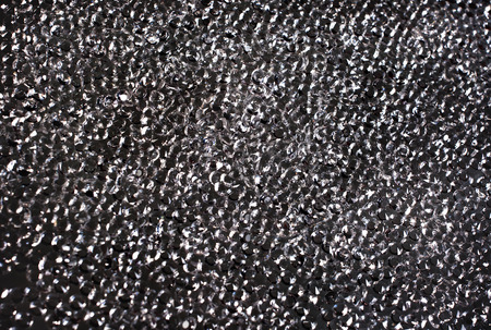 Shiny crystal drops  Bright crystals on dark gray background の写真素材