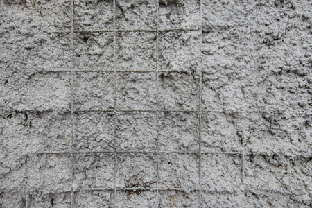 Grey concrete wall texture customizable suitable for background use.の写真素材