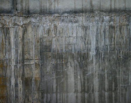 Raw concrete wall texture, customizable, suitable for background use.の写真素材