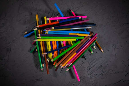 Many Colored Pencils on a Dark Backgroundの写真素材