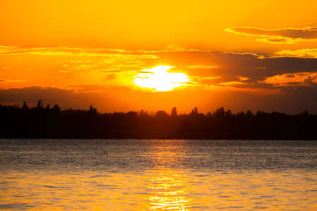 Bright sunset on the seaの写真素材