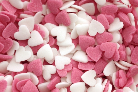 Pink and white sugar hearts background