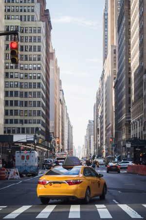 Yellow Cab engage in the streets of Manhattan in New Yorkのeditorial素材