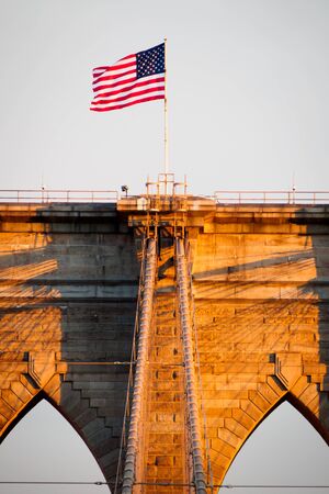 Brooklyn bridge at sunset in NYC