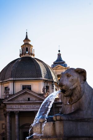 Lion fountain in Piazza del Popolo in Rome, Italyの写真素材