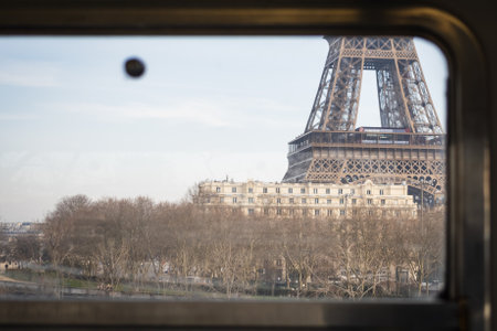 The Eiffel Tower seen from an elevated train in Paris - Parisian landscapeの写真素材