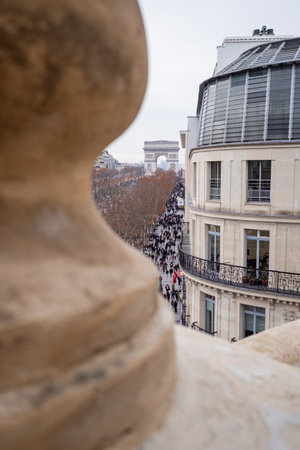 The Champs-Élysées and the Arc de Triomphe seen from a building balcony on the avenue before the...