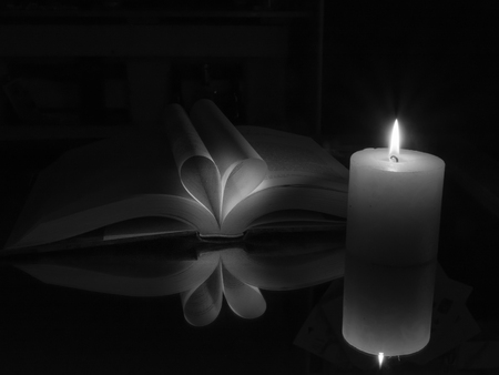 The book and the candleの写真素材