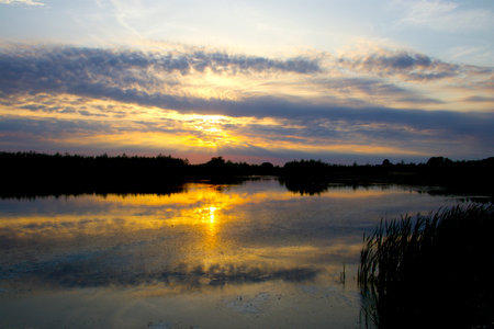 Special light at sunset just before dusk at the lake
