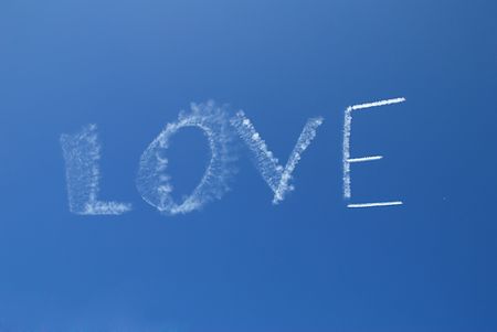 Skywriting the word Love on a clear dayの写真素材