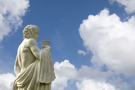 Stone carving of ancient roman soldier with blue sky backgroundの写真素材