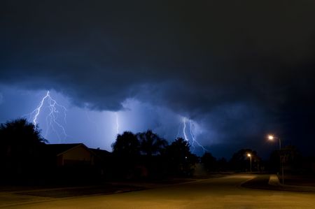 Simultaneous multiple lightning strikes in a neighborhoodの写真素材