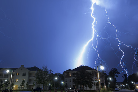 Massive lightning strike in a neighborhoodの写真素材