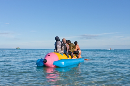 Group of people on banana boat のeditorial素材