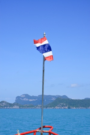 Thai flag flying over seaの写真素材