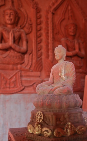 old smilling budha sitting in meditation pose の写真素材
