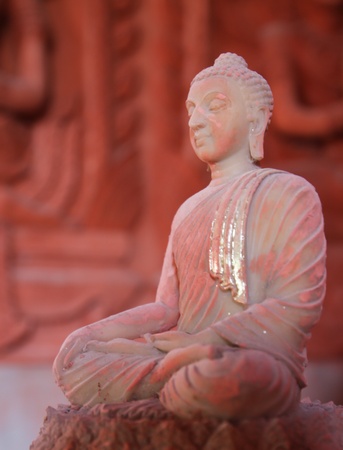 old smilling budha sitting in meditation pose の写真素材