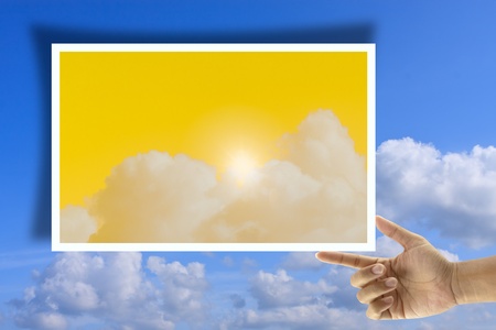 artwork of two hands holding picture frame. の写真素材