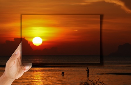 artwork of  hand holding picture frame. の写真素材