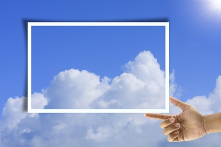 artwork of hand holding picture frame. の写真素材