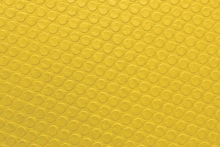 yellow leather surface as backgroundの写真素材