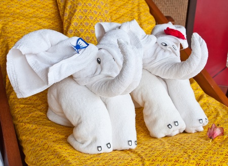 white elephant towel decoration in Thai style hotel roomの写真素材