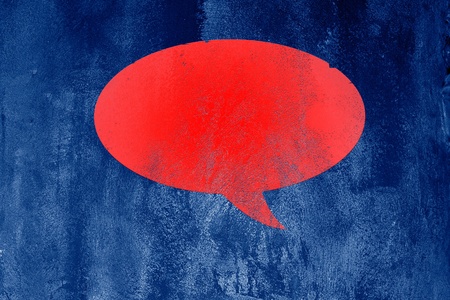 Red blank Speech Bubble on abstract  blue backgroundの写真素材