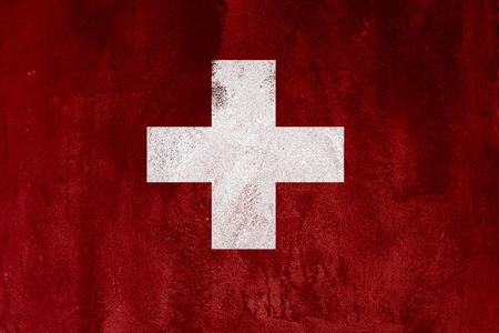 flag of switzerland  on abstract cement wallの写真素材