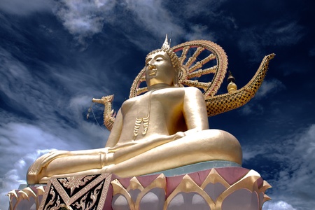 golden Big Buddha statue against blue sky in Samui island,Thailandの写真素材