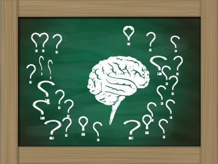 brain thinking conceptual on green chalkboardの写真素材