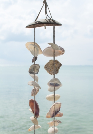 Shell mobile on resort over ocean in Thailandの写真素材