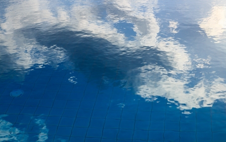 Swimming pool with cloudの写真素材