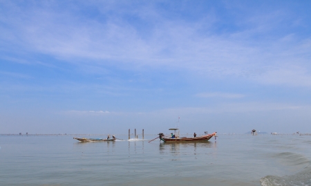 long tail boat in the blue sea and sky,Thailandの写真素材