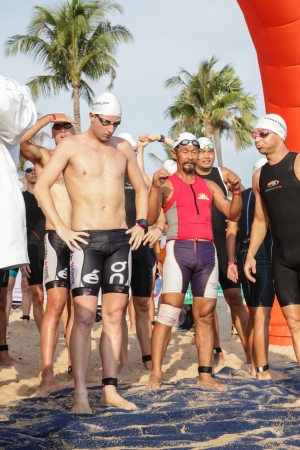 SAMUI, THAILAND - APRIL 21 2013-: Samui Triathlon 2013 event. Competitors in action during the triathlon on Sunday 21 April 2013 in Ko Samui island, Suratthani, Thailand.のeditorial素材