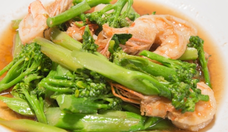 prawns with broccoli fried sauce on white dishの写真素材