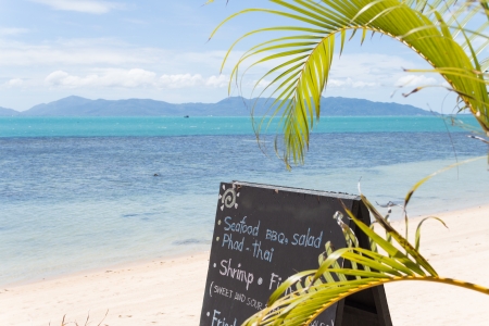 Blackboard menu bar beachside restaurantの写真素材