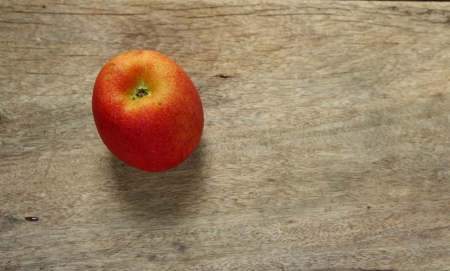 Red apple on wooden の写真素材